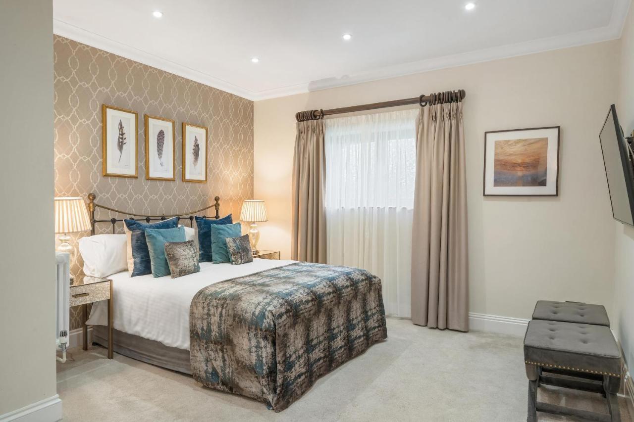 Boringdon Hall Hotel And Spa Plymouth Exterior photo A bedroom at The Old Bank Hotel