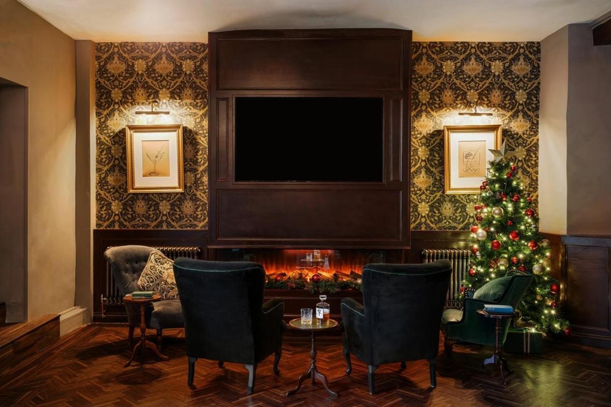 Boringdon Hall Hotel And Spa Plymouth Exterior photo The fireplace in the lobby